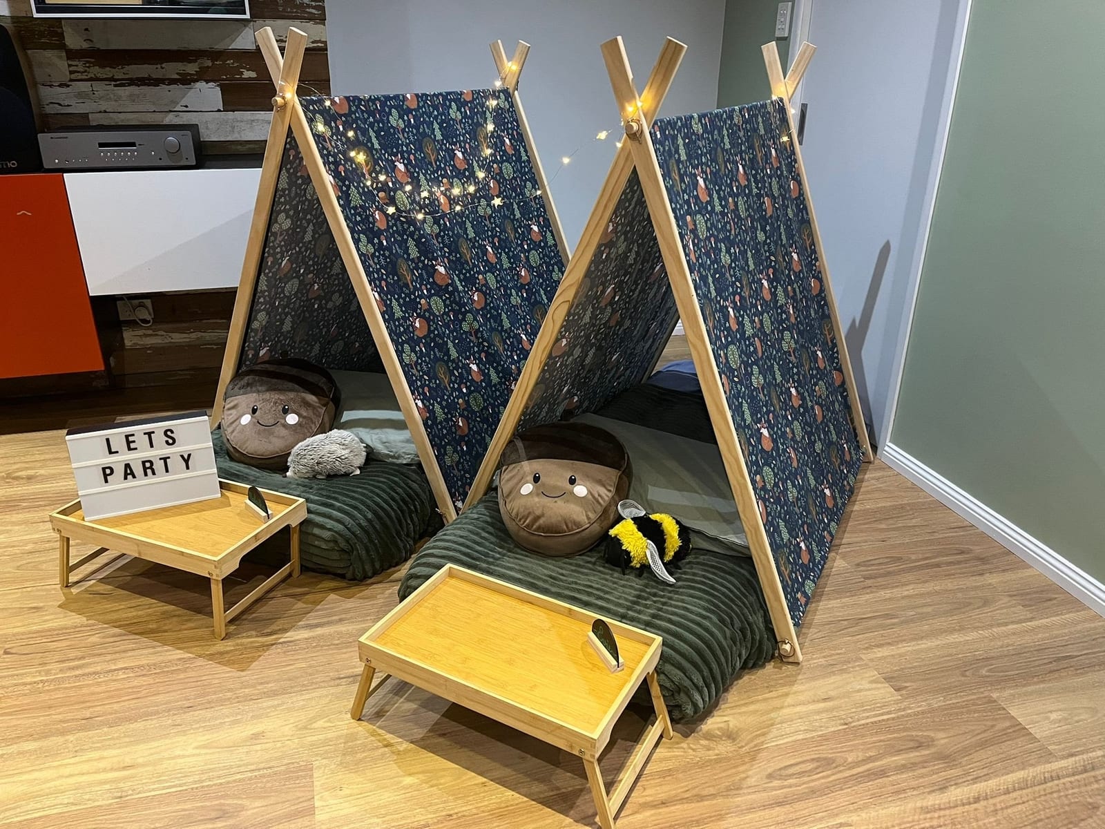 Teepees styled beside a mirror